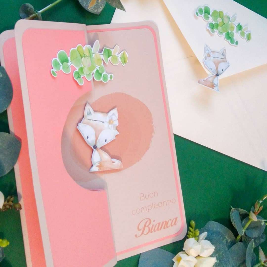 Biglietto di auguri con figura rotante